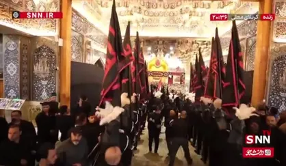 انتقال با شکوه پرچم عزا جهت تعویض پرچم گنبد حرم امام حسین(ع)