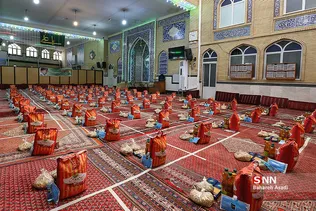 تهیه بسته مواد غذایی و جهیزیه در مسجد روحانی