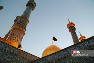 
مراسم تعویض پرچم گنبد حرم حضرت معصومه (س)