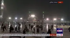 اذان مغرب در مسجد مقدس جمکران همراه بارش زیبا باران