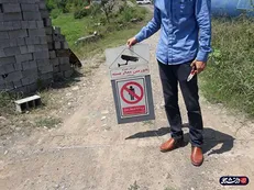 دانشجویان بسیجی تابلوی «باستی هیلز» لاهیجان را پایین آوردند / حکایات اعیان نشین‌ها در محله‌های خاص!