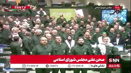 همه نمایندگان مجلس لباس سپاه به تن کردند