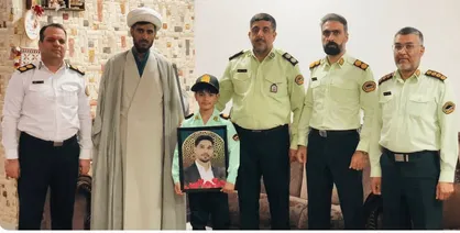 آرزوی پلیس شدن در خانه شهید لامردی؛ فرمانده انتظامی با لباس پلیس فرزند معلم شهید را غافلگیر کرد