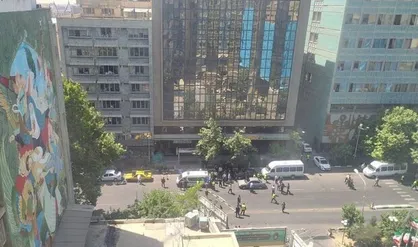 درگیری اشرار با دو مأمور پلیس در خیابان طالقانی