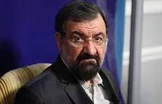 ادای احترام محسن رضایی به پیکر شهید مدافع حرم 