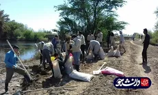 جهادگران بسیج دانشجویی واحد اهواز سیل‌بند روستای هوفل سیدناصر را ترمیم کردند + عکس