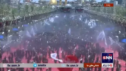 ورود دسته های عزاداری در ظهر عاشورای کربلا به حرم امام حسین (ع)