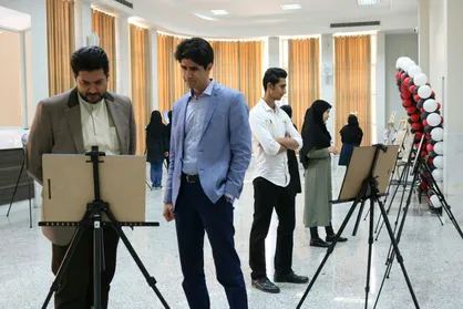 نمایشگاه عکس سیاست روزمره در دانشگاه فردوسی مشهد برگزار شد
