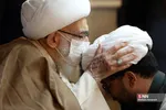 
ملبس شدن جمعی از طلاب به دست آیت الله نوری همدانی
