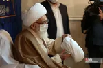 
ملبس شدن جمعی از طلاب به دست آیت الله نوری همدانی
