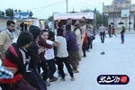 خدمت رسانی دانشجویان خوزستانی به سیل زدگان اسکان داده شده در یادمان شهدای هویزه