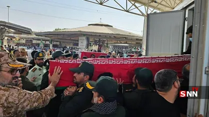 ورود پیکر مطهر شهدای حمله آمریکایی-سعودی به کشور از مرز مهران + فیلم