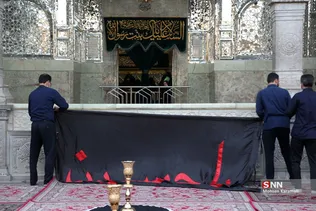 آیین تعویض پرچم حرم مطهر حضرت معصومه(س)
