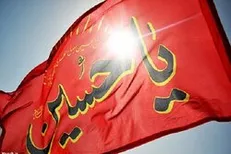 تصاویری از مراحل آماده سازی پرچم عزای گنبد امام حسین (ع)
