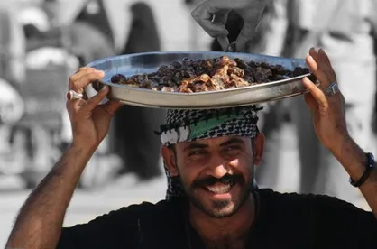 نمایش عکس&zwnj;های &laquo;ایران والعراق لایمکن الفراق&raquo;