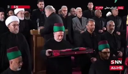 پرچم سیاه عزای سید الشهدا (ع) آماده انتقال جهت برافراشته شدن برفراز گنبد مطهر شد