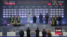 نشان برق طلا بر سینه یونس امامی