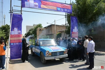توزیع ۲۰۰ بسته لوازم خانگی اهدایی شیعیان ترکمان عراق به سیل زدگان + عکس