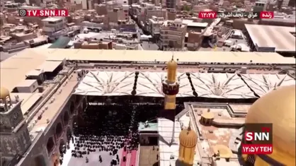 نمایی از گنبد و گلدسته حرم مطهر امیرالمومنین (ع)