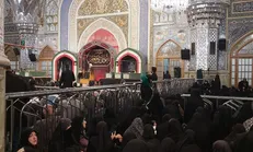 وداع زائران حرم رضوی با شهدای مدافع حرم تیپ فاطمیون+فیلم