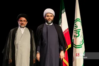 حجت الاسلام محمد قمی رئیس جدید سازمان تبلیغات اسلامی در کنار حجت الاسلام خاموشی رئیس سابق این سازمان