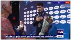 لحظه ی اهدای مدال نقره به امیرمحمد یزدانی