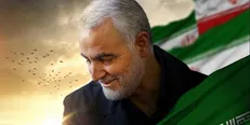 تصویر شهید سپهبد قاسم سلیمانی بر سردر لانه جاسوسی سابق آمریکا نصب شد + فیلم