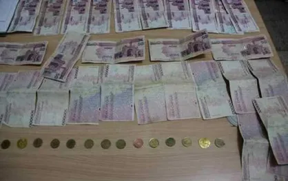 بازداشت جاعلان تراول چک و دلار