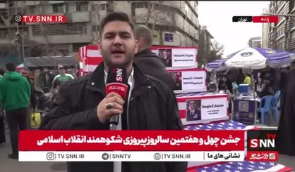 تابوت&zwnj;های نمادین فرماندهان نظامی آمریکا در مسیر راهپیمایی ۲۲ بهمن / گزارش خبرنگار SNNTV از مقابل دانشگاه تهران