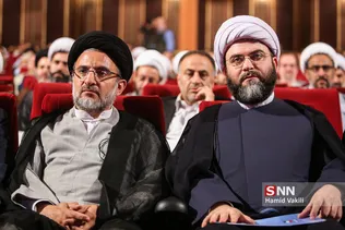 حجت الاسلام محمد قمی رئیس جدید سازمان تبلیغات اسلامی در کنار حجت الاسلام خاموشی رئیس سابق این سازمان