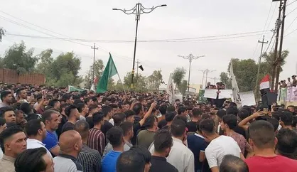 تظاهرات طرفداران الفتح مقابل مرکز انتخابات کربلا