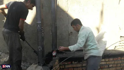 دیوار چینی منزل یک خانواده نیازمند از سوی دانشجویان دانشگاه صنعتی همدان آغاز شد