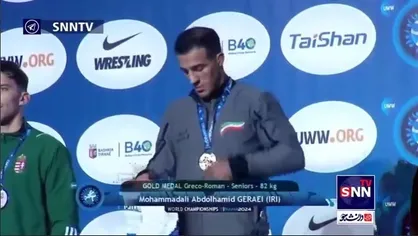 لحظه اهدای مدال طلا به محمد&zwnj;علی گرایی