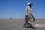 قم