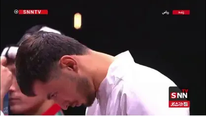 احترام نظامی عرفان محرمی هنگام برافراشته شدن پرچم مقدس ایران