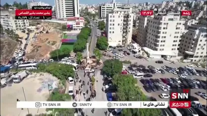 تصاویر هوایی از ورود اتوبوس های حامل آزادگان فلسطینی اهل نوار غزه به رام الله