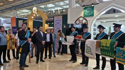 حضور خدام حضرت علی&zwnj;بن موسی&zwnj;الرضا (ع) در نمایشگاه کتاب تهران + فیلم