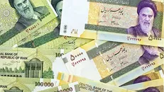 واحد پول ملی «تومان» می‌شود