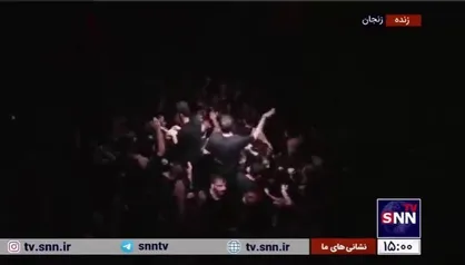 هروله ظهر عاشورایی عزادارن حسینی در هیئت ثارالله زنجان با مداحی مهدی رسولی