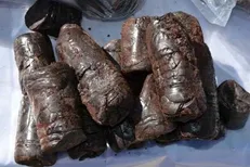 خرده فروشی تریاک با گونی برنج