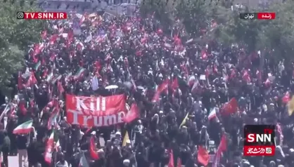 دست&zwnj;نوشته "KILL TRUMP" در مراسم تشییع پیکر رهبر شهید