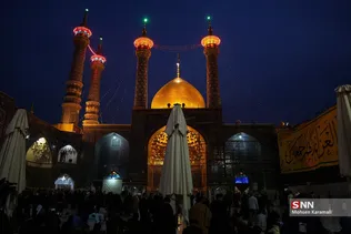 آیین تعویض پرچم گنبد حرم مطهر حضرت معصومه