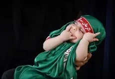 برپایی آیین شیرخوارگان حسینی در نخستین روز ماه محرم در حرم مطهر رضوی + فیلم