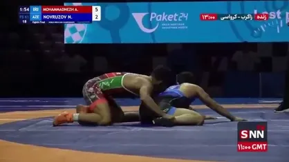 محمدنژاد با عبور از حریف آذربایجانی راهی یک چهارم نهایی شد