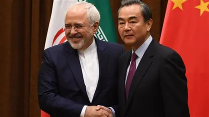 وزیر خارجه چین: ظریف در مونیخ با صدای بلند از حقوق ایران دفاع کرد