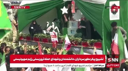 تبرک جستن مردم به پیکر شهدای کودک جنگ تحمیلی
