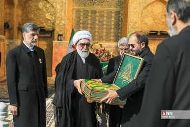 آیین تعویض پرچم و پوش ضریح مطهر رضوی