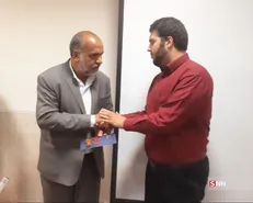 کتاب زخم بنزین به نماینده مردم یزد در مجلس تقدیم شد
