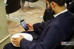 
ملبس شدن جمعی از طلاب به دست آیت الله نوری همدانی

