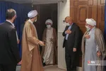 
ملبس شدن جمعی از طلاب به دست آیت الله نوری همدانی
